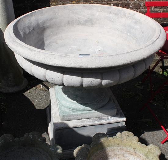 Large fruited stone urn